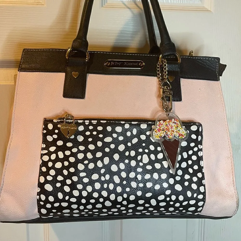 Betsey Johnson vegan leather pink & beige with black & white pocket,black straps